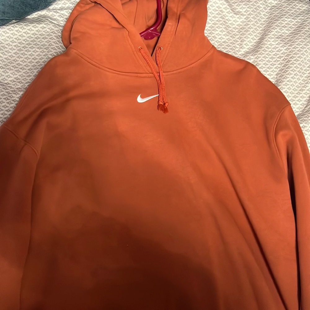 burnt orange colored hoodie
